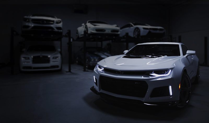 Site da AutoPrime Veículos — showroom escuro com carros premium